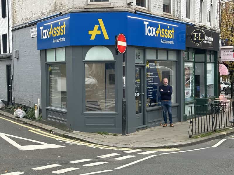 An image of a TaxAssist storefront showing their new outdoor signage.